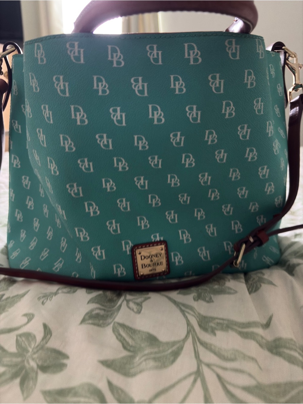 Dooney & Bourke Teal Monogram Satchel w/Crossbody strap, brown trim, gold detail